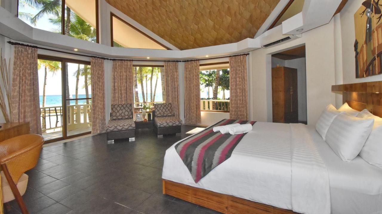 Ambassador In Paradise Balabag  Εξωτερικό φωτογραφία A bedroom at the resort